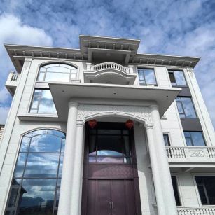 南通白麻别墅外墙干挂石材效果示例