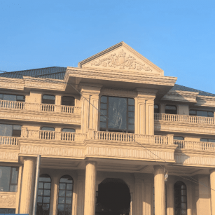 南通黄金麻别墅外墙干挂石材效果示例