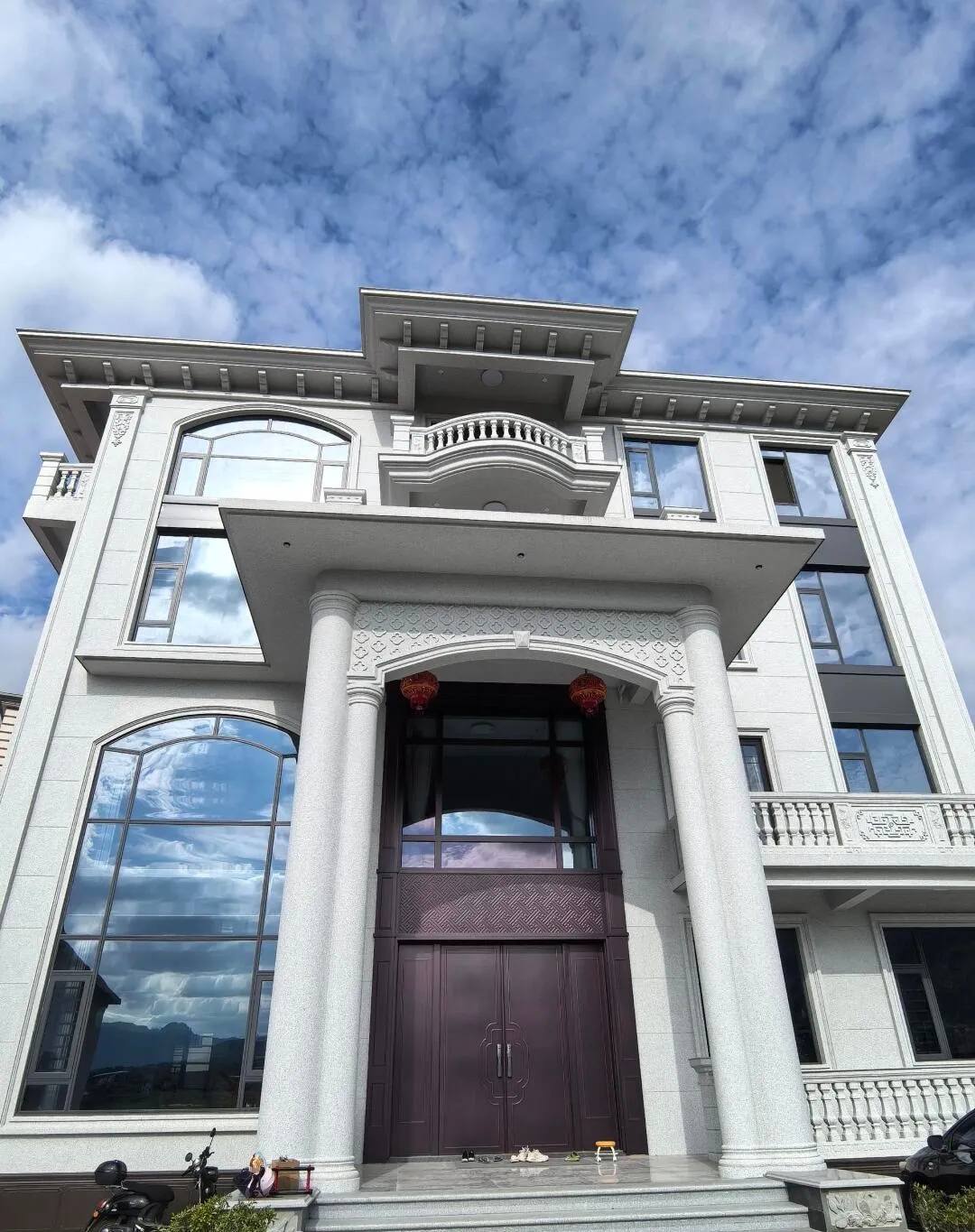 南通白麻别墅外墙干挂石材效果示例